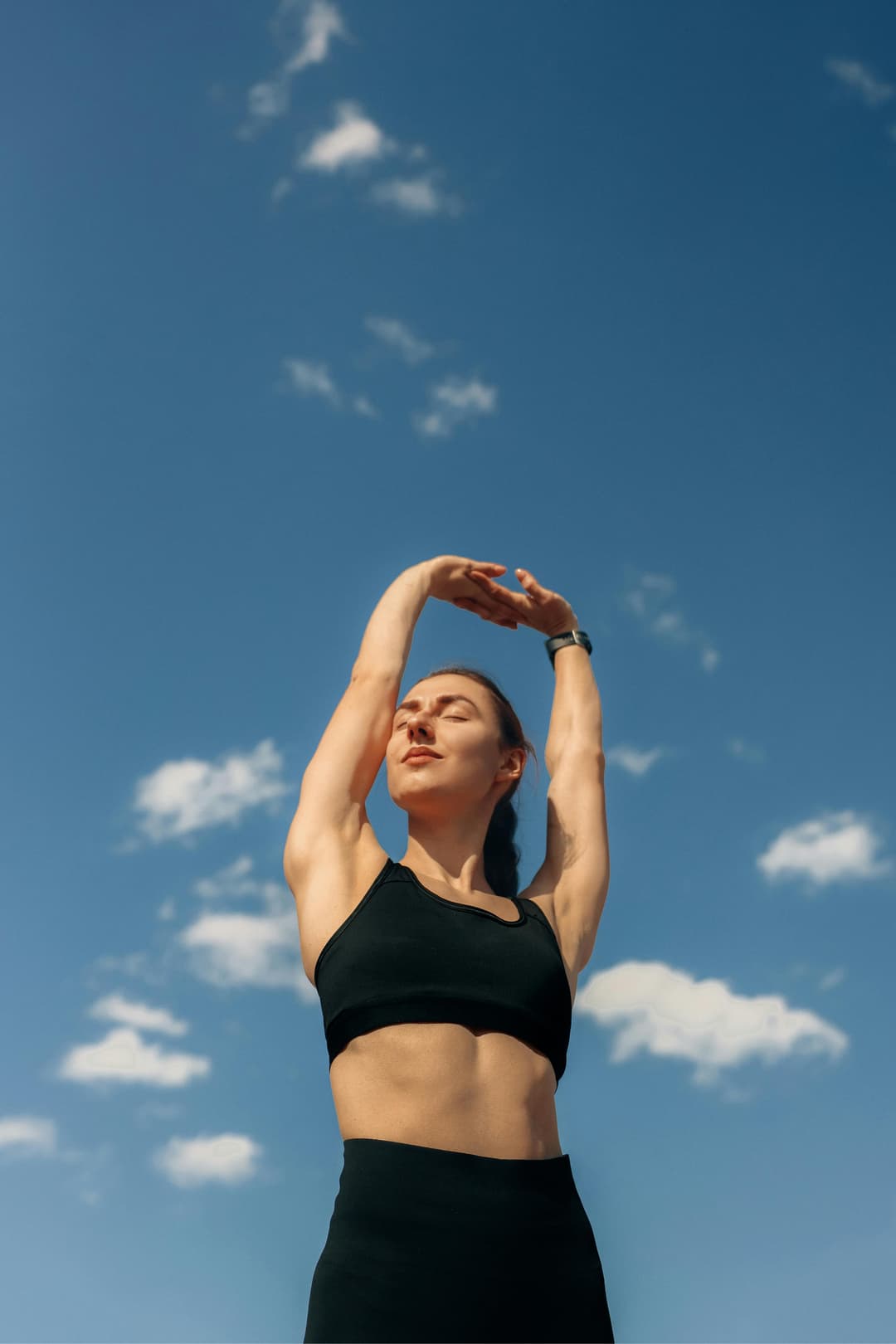 Person stretching and feeling free of money worries